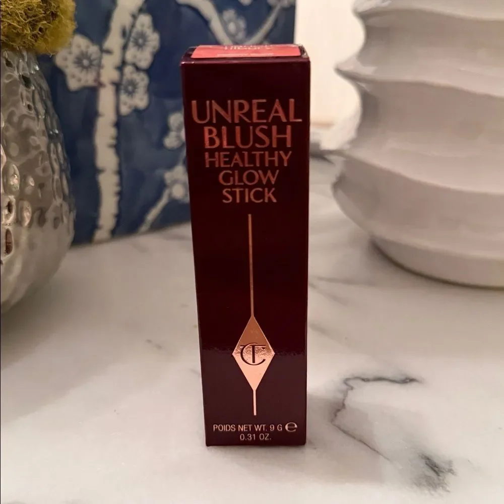 Charlotte Tilbury Unreal Lip + Cheek Glow Blush Stick with Hyaluronic Acid